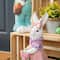 Glitzhome® 17.5" Easter Bunny Girl with Flower Basket Table Décor